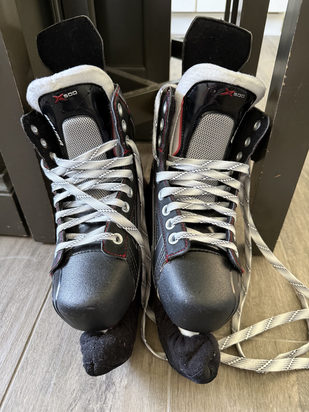 Bauer Black Hockey Skates with White Tongue and Red Stitching